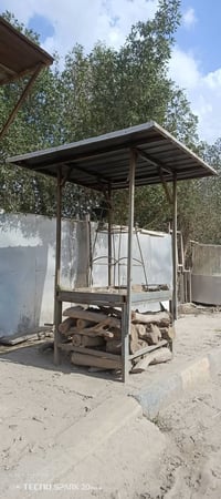 شواية سمك • حطب • ديوانية