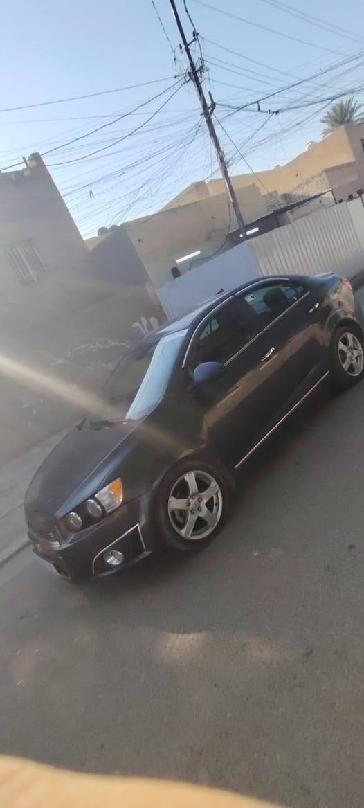 شوفرليت سونيك فئة الرياضي LTZ موديل 2013 مواصفات لايت ثلجي عالي ناصي تحكم مري تحكم ستيرن كامل كشنات جلد تدفئه السياره جدآ نضيفه وحلوه رقم جديد الدولي بغداد بأسمي السعر 70 وبيه مجال بسيط رقم الهاتف ***********
