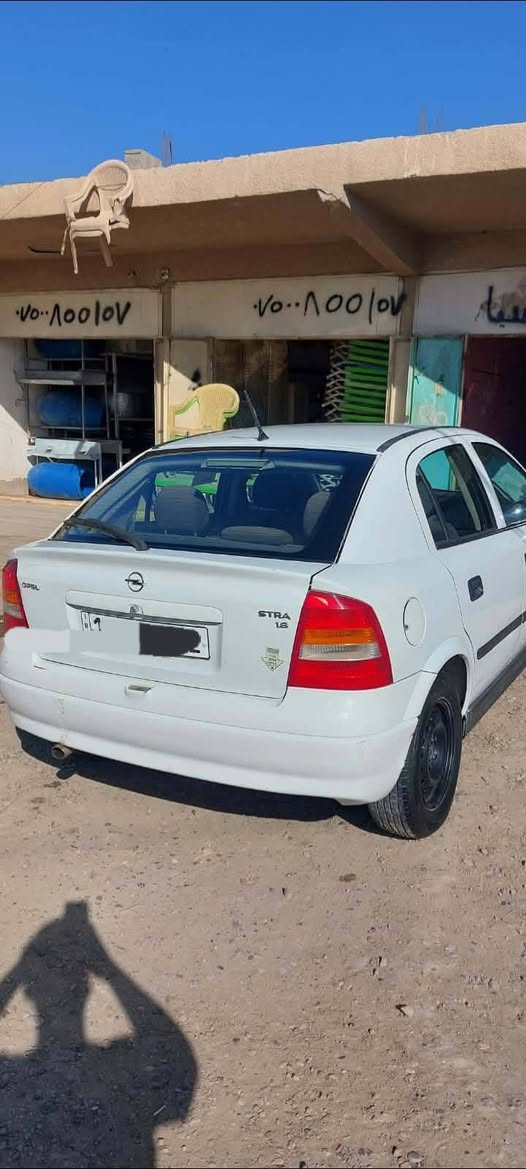 اوبل استرا مديل 2002 سياره بلاديه على وضع الشركه الاصليه كله بلاد كشر وداخل بدون ضربه وبدون صبغ الكشر كلش نضيف باسمي رقم بغداد مكاني بغداد عامريه وابو غريب السعر 60 وبيها مجال بسيط ***********
