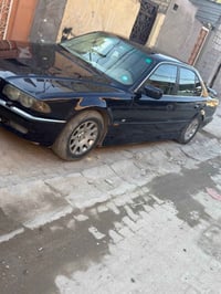 بي ام كاسحه 730 اصل وفصل بليته وسنويه ومكينه موديل 1995 اصل ماملعوب بي...