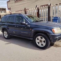 للبيع جيب شيروكي 2001 محرك 8سلندر4700 كشنات جلد كرسي السائق والسكن كهر...