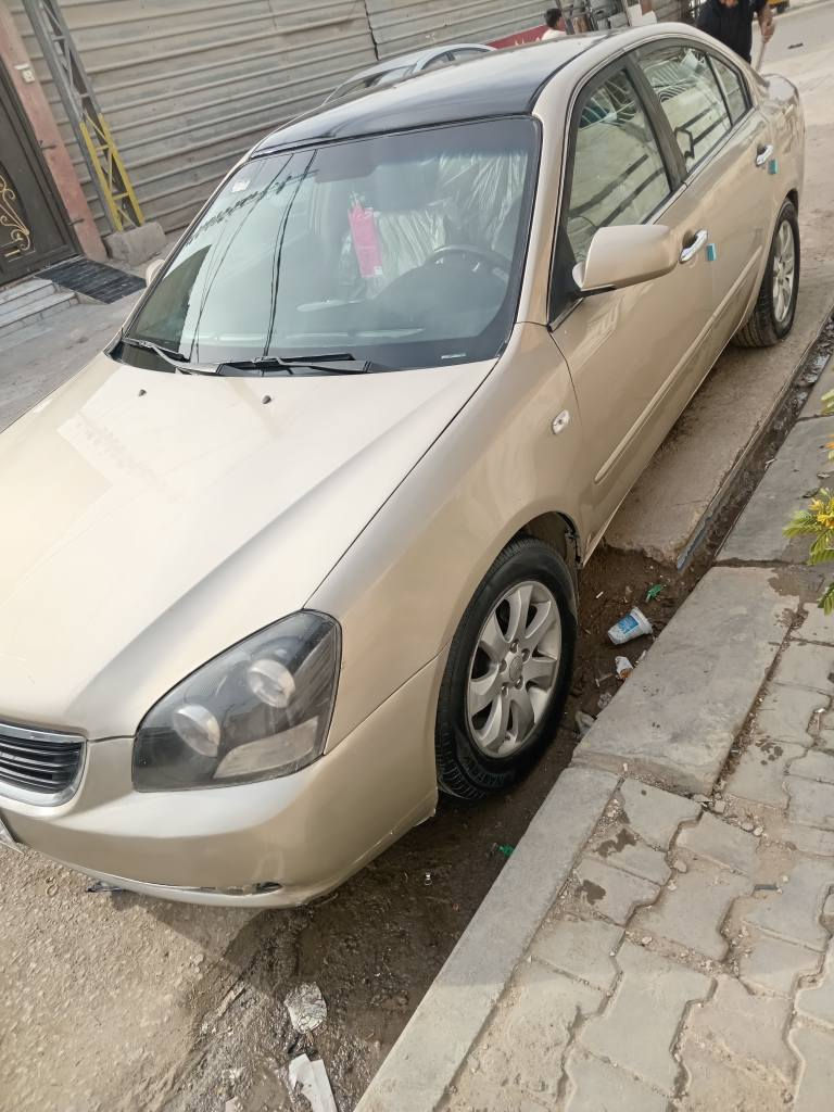 اوبتيما ٢٠٠٦ اوتو.. صبغ عام ضررها جامغ خلفي وباب معمره تعمير حلو جاهزه كير ومحرك سته سلندر مالكها يريد 
 تحويل تخم تاير حداديه كهربائيات جديده مكانها كربلاء سعرها ٧٠ وبيها مجال بسيط  للشراي.. ت *********** كربلاء, العراق
