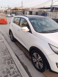 سبورتاج ٢٠١٥ • فتحة • بصمة