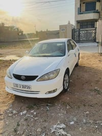 مTOYOTA كامري 2004 شرط التحويل رقم اربيل محرك 6 بيه 3 قطع بدون دواخل ص...