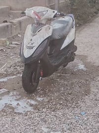 دراجه كامكو جي فور محرك توني شاده حاويه جديد السعر 375 وبيها مجال بسيط...