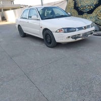پرۆتۆن • ٢٠٠٤ • اوتوماتيك