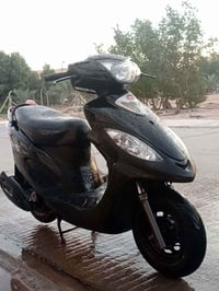 كامكو V2 • دراجة نارية • كامكو • دراجة • مكفولة • كهرباء • بك لايت