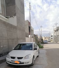 لانسر ٢٠٠٦ • ١٥٠٠ • قير عادي