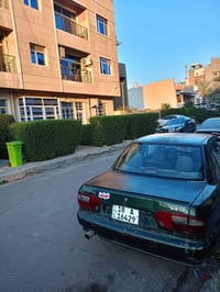 بروتون ويرا موديل 2002 رقم بابل انكليزي بأسمي كير ومحرك مكفول لا تنقيص...