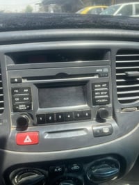 عندي مسجل ريو 2012 احمر شغال  07710405378