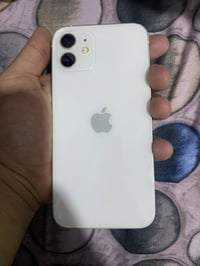 آيفون 12 العادي جهاز  مكفول من كلشي  كله بلادي بطاريته 75 ذاكره 128سعر...