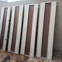 باب دفتري مع ملبن كامل الارتفاع 240 م والعرض 280 م شرط حديد ثقيل للتوا...