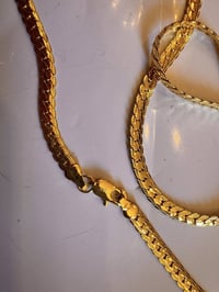 زنجيل ذهبي • مختوم ٢٤ك • توصيل