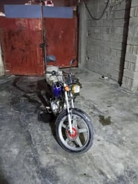 دراجه ايراني موديل 22 محركها اخو الجديد حيل نضيف لشراي يتصل 0786667746...