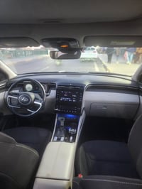 HYUNDAI TUCSON 2022 هيونداي توسان  فول VIP لون نفطي  رقم اربيل    محرك...