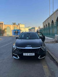 كيا سبورتج SX بريستيج 2023  اللون اسود حادث باب السائق والباب الخلفه ف...