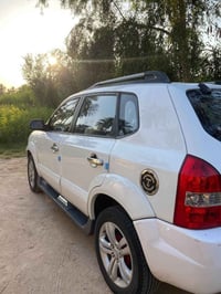 توسان ٢٠٠٩ • مكينة ٢٠٠٠ • رقم بغداد