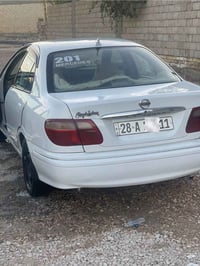 صني ٢٠٠٣ • مكينة ١٦٠٠ • رقم نجف ل٢٠٣٠