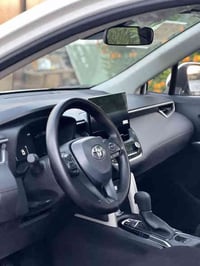 للبيع كورلا كروز 2025 رقم بغداد ماشية 10 الف  مكفولة كفالة عامة✅ مواصف...