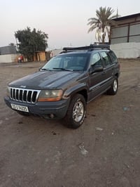ا‏لسلام عليكم جيب شيروكي موديل 2004 كير أوتوماتيك تو ويل تخم تاير مكين...