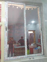 معمل الكرار للالمنيوم يعمل كافة الشبابيك السلايت والمفصلي وأبواب وpvc0...