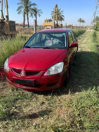 موديل 2004كير عادي بلاد بدون صبغ مل مزاد واصل الرقم كير ومحرك بصيف جدن...