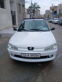 يجو فرنسي 2002  السيارة بسمي هزه وسنوية ورقم بغداد جديد تخم تاير وصدر ...