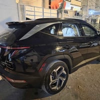 توكسان 2023 هايبرد لمتد ٤ كامرات كشنات تحكم وخزن وتدفئة وتبريد  بصمة ت...