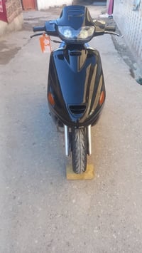 دراجة • حاوية