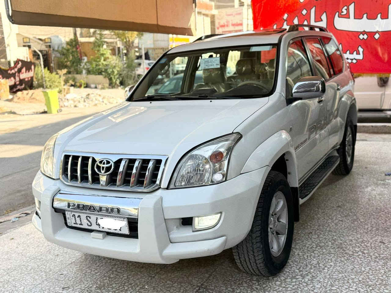 السلام عليكم ورحمه الله وبركاته.                  برادو موديل 2007 للبيع فقط وليس للمراوس.                                             فول مواصفات VX.   كويتي    اعلى فئه 1/1.          مكينه 6/سلندر      7 راكب.  فتحه سقف.    تحكم ستيرن               كشنات جلد.  كشنات كهرباء جهتين                  فور ويل  سبير تعليك دبل تانكي.                داخل صاج 3قطع تبريد ثلاجه   جام اوتوماتيك                منضومه LED عالي.    ناصي هوك خلفي.        شاشه كامره ايباد      وبعد بيها هواي مواصفات معروفة مواصفات.      الفول   كير مكينة  صدر تخم تاير كله جديد مابيها اي نقص.                        رقم بغداد الإنكليزي الجديد بسمي سنويه جديده العنوان بغداد الإتصال على الرقم *********** بغداد, العراق
