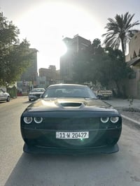 جالنجر GT . موديل٢٠٢٢ ماشيه ٣٥ الف ميل . رقم بغداد بسمي . فول مواصفات ...