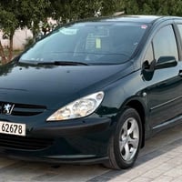 بيجو 2005  كير اوتو كير مكينه مكفولات  تبريد ثلج  تخم تاير ويل كب جديد...