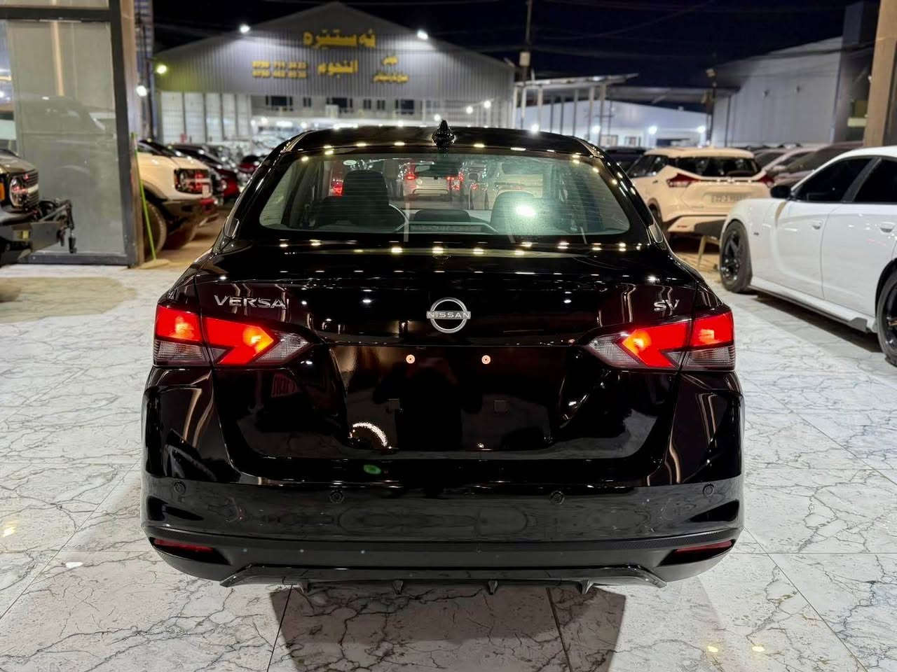 Nissan Versa 2024 SV
* دةعـامي بـو دةعـامي بةشةرت دوو دةرگاي بيلادي گورراوة بي سبوغة پشـتو پيش كةپـس بـي ايرباگــ 
* رةنگـ رةشــى قـةتــران 
* مـواسةفات SV گيـچ الكتــرؤنـى بصمة رادراي خةـتي جادةو تةحديد صورعة ئـاوينة ' دةعـامي حةساس كوشيـن شاموو كاميـرة
* ١٩ هـةزار مايل رويشتوة 
* 3N1CN8EV4RL914224 
* سيارة بدون صبغ
* بابين مبدلات بلادي
* ايرباكات سليم %💯
* مسافة 19,000 𝑴𝒊𝒍𝒆𝒔
* *********** 📞📞 أربيل, العراق
