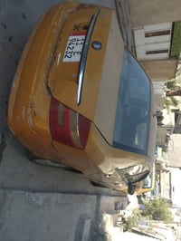 جيلي ١٣ • محرك كورلا • رقم بغداد