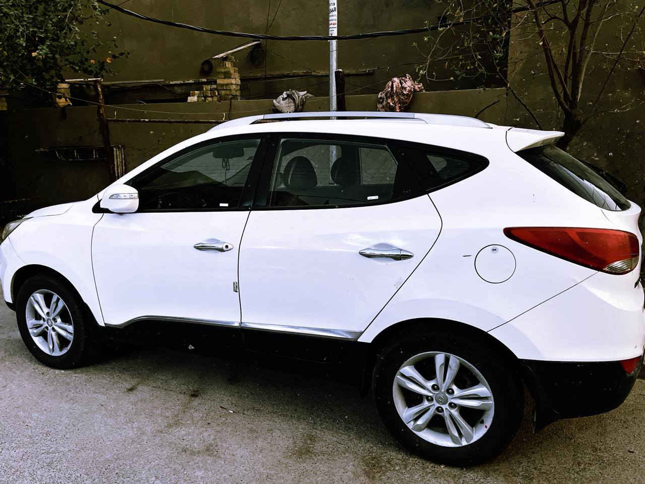 توسان١٣  بيهه قطعتين صبغ رقم بغداد بسمي رقم هاتف ***********
