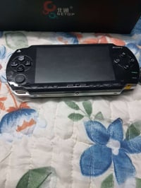 جهاز psp fat محولة لاصلية وقاعدة شحن وسماعة ويموت جهاز نضيف مامستخدم ش...