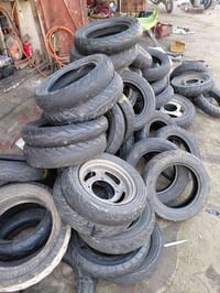 تايرات تايلندي وفيتنامي • قياس ٩٠/٩٠-١٠ • محل عمار