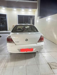 نيسان سني 2008 باسمي بغداد رقم انكليزي ضربات قوية تبديل مابيها محرك كي...