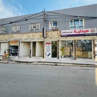 حي الملايين • عمارة تجارية • ٧ محلات مؤجرة