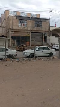 حي الجامعة النجف • عقار تجاري • ٢٠٠م مع محلين