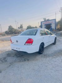 نيسان صني موديل ١٠ سياره نضيفه جدا مكينه كير حداديه تخم تاير تبريد كهر...