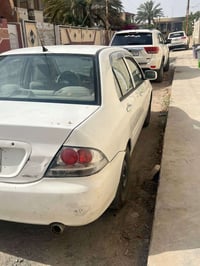 جميعاً  لانسر بومة ٢٠٠٩  مكينة ٢٠٠٠ كير ومكينة خير من الله  تبريد منظو...