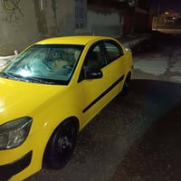 كيا ريو  امريكي موديل 2010 رقم ديالى اني الشرعي مالها كابون بانزين بيه...