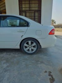 اوبتما 2006 محرك كير خير من الله سياره بيها صبغ قليل  ابيعلك حزام سيار...