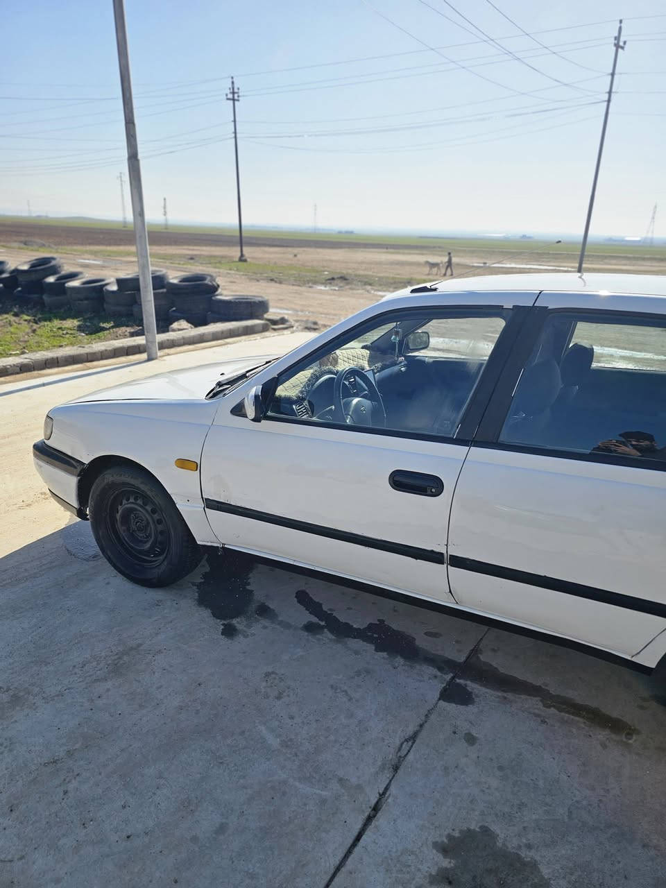 🚗 للبيع: نيسان صني موديل 1993 (ياباني أصلي) 
​للبيع سيارة نيسان صني موديل 1993، السيارة بحالة ممتازة وما يحتاج تدفع عليها مصروف، جاهزة للاستخدام المباشر.
​📌 المواصفات والتفاصيل:
​الموديل: 1993
​الجير (الناقل): [عادي]
​المحرك: بحالة اقتصادية جداً في استهلاك الوقود.
​التكييف: يحتاج بس غاز 
​الوضع القانوني: [السنوية مجددة / اللوحات جديدة / الهزة والفحص ساري]
​الداخلية: نظيفة جداً وبحالة الوكالة.
​الخارجية: صبغ نظيف، لا توجد حوادث قوية (شاصي سليم).
​✨ المميزات الإضافية:
​[مثال: مسجل وسماعات شغالين تمام]
​سيارة عملية جداً، قطع غيارها متوفرة ورخيصة، واعتمادية للمشاوير اليومية.
​💰 السعر المطلوب:
​السعر: [37$] (قابل للتفاوض بالمعقول بعد المعاينة).
​📞 للتواصل والاستفسار:
​المكان / المحافظة: [ سهل نينوى، برطله]
​رقم الهاتف: [***********/***********]
​(الرجاء الاتصل فقط، أو التواصل واتساب).
