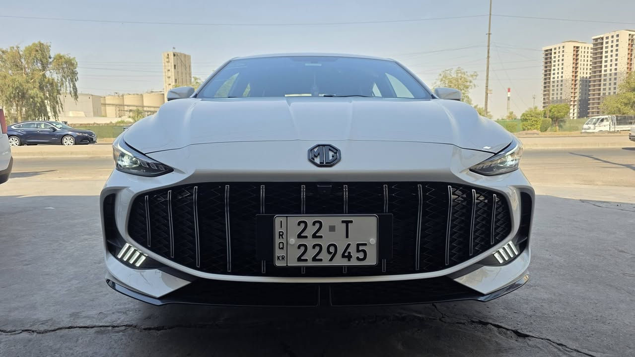 📣 للبيع: MG5 GT موديل 2025 بحالة الزيرو جديده كلش وبيها اضافات كماليات تقريبآ بال 600 الف
​الموديل: 2025
​المسافة المقطوعة: 13,000 كيلومتر فقط
​المحرك: 1500 DVVT اقتصادي وقوي جداً
​🛡️ السيارة مكفولة كفالة عامة من كل شيء (حادث، صبغ، بارد) 
​🚗 بحالة البلاد ممتازة ونظيفة جداً (داخلية وخارجية) ولا تحتاج لأي مصاريف.
​أبرز المواصفات والميزات:
​☀️ فتحة سقف سلايد . تبريد خلفي
​💺 داخلية جلد أسود مميزة ومطرزة بخيوط حمراء رياضية بحالة الوكالة (أكياس الشركة لا تزال على بعض القطع).
​🎥 شاشة عرض كبيرة تدعم أنظمة الترفيه
 كاميرا 360 درجة (رؤية محيطية كاملة).
​🖥️ شاشة عدادات رقمية (ديجيتال) حديثة.
​🔘 نظام التشغيل الذكي (بصمة تشغيل وبصمة أبواب).
​🅿️ مكبح يد إلكتروني (Handbrake دكمة) مع نظام Auto Hold.
​🎡 مقود مطرز متعدد الوظائف (تحكم ستيرن كامل).
​💡 إضاءة أمامية وخلفية LED حديثة مع حساسات خلفية للمساعدة على الركن.
​🛞 ويلاد كروم رياضية مميزة ونظيفة جداً.
​📌 مكان السياره بغداد السيدية
​الرقم: [ اربيل هزة وفحص جديد] السنويه بأسمي
​السعر المطلـوب: [ 125 ورقه ]
 (للجادين فقط) التواصل والاستفسار : [*********** / ***********]
