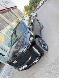 كاديلاك سكاليد موديل23 كفاله  من الصبغ والبارد  مغلفه ppf مكان السياره...