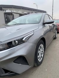 كيا كي3 موديل 2022 وارد كوري رقم بغداد بأسمي السيارة مكفولة من الصبغ و...