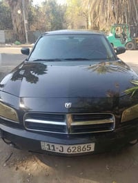 جارجر 2010 اسود محرك وكير وصدر وتبريد مكفولات كهرباء كاملة السيارة مبي...