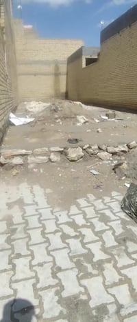 قطعه للبيع100 خلف الملعب القديم شارع 10 شارع علي العبادي07855006154